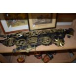 COLLECTION OF HORSE BRASSES ON LEATHER STRAPS