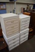 FOUR WHITE BEDSIDE CABINETS