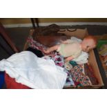 A BOX OF VARIOUS ASSORTED CUSHION COVERS, LINEN, VINTAGE PLASTIC BODIED DOLL AND OTHER ITEMS