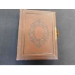 Victorian carte de visite album containing a few cards only, 4to, panelled calf, brass clasp and