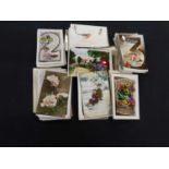 Box: assorted glossy greetings picture postcards, some with postmark interest including rubber and