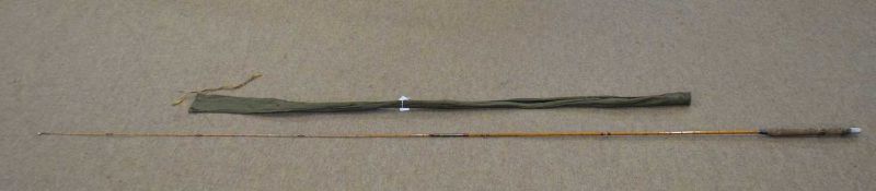 20th century 2-part bamboo fly fishing rod with a cork handle grip and brass sliding bands. 6x