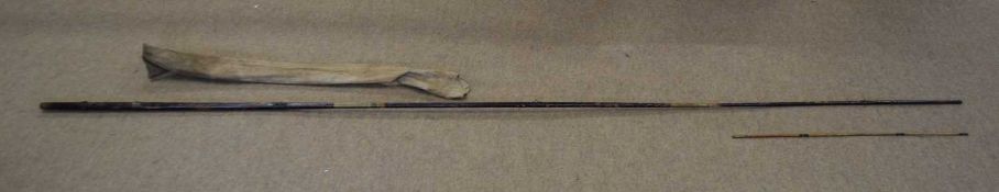 An antique 4-part wooden fishing rod (A/F – snapped at the final joining part) with two brass
