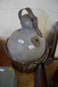 ALUMINIUM CARBOY TYPE BOTTLE WITH WICKER FRAME