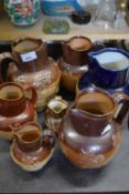 MIXED LOT: VARIOUS DOULTON AND OTHER STONE WARE HARVEST JUGS