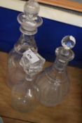 THREE VARIOUS CLEAR GLASS DECANTERS