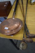 THREE VINTAGE WOODEN GOLF CLUBS TOGETHER WITH A COPPER BED WARMING PAN