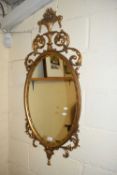 CONTEMPORARY OVAL WALL MIRROR IN GILT EFFECT FRAME