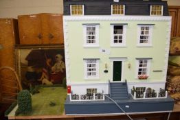A LARGE CONTEMPORARY DOLLS HOUSE MARKED TO THE FRONT "OSBORNE HOUSE DARTMOUTH MEWS", FITTED WITH