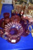 COLLECTION OF VARIOUS CRANBERRY GLASS WARES TO INCLUDE BELLS, VASES AND OTHER ITEMS