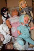 BOX OF VARIOUS ASSORTED DOLLS TO INCLUDE MODERN PORCELAIN HEADED EXAMPLES