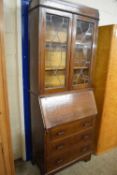 EARLY 20TH CENTURY OAK BUREAU BOOKCASE WITH LEAD GLAZED TOP SECTION