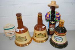 COLLECTION OF WADE WHISKEY BELLS AND RUM LIQUER BOTTLE AND A SMALL SHERRY BARREL