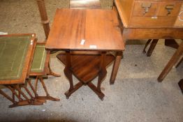 MAHOGANY TWO TIER OCCASIONAL TABLE OF UNUSUAL CONFIGURATION, PROBABLY ART DECO TO DESIGN