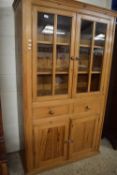 20TH CENTURY PINE CUPBOARD WITH GLAZED TOP SECTION
