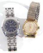 Lot of two gents wristwatches. One is an automatic 25 jewel tradition watch with a day/date aperture