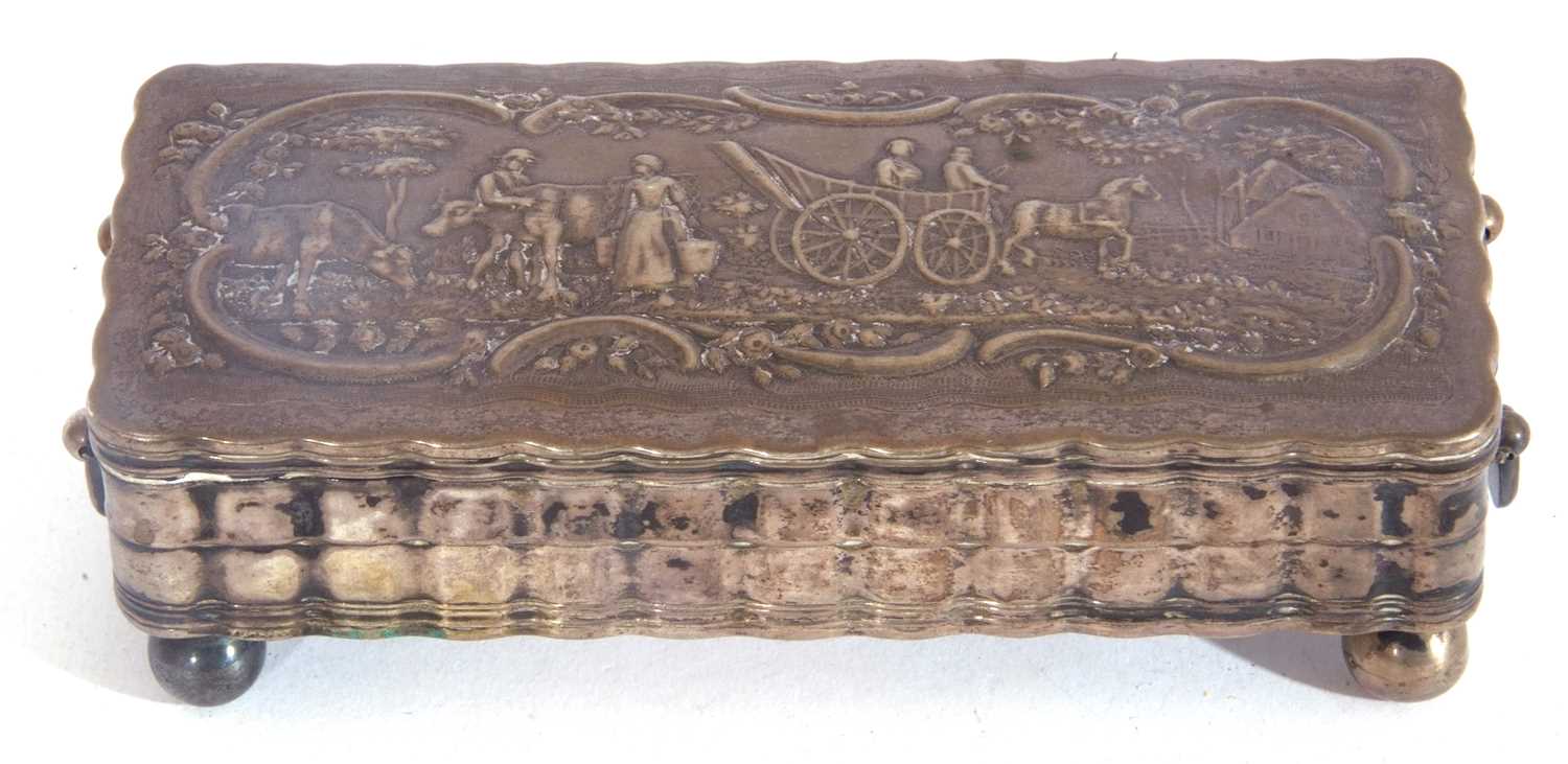 19th Century white metal Dutch trinket box of rectangular form, the hinged lid with embossed