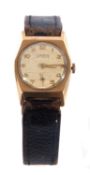 A 9ct Gold Lanco wrist watch. The watch has a manually crown wound movement, a cream dial and gold