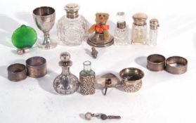 Mixed lot including four silver serviette rings, a silver goblet shaped egg cup, six various glass