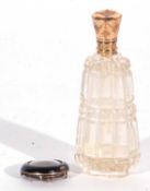 19th century, probably French, cut glass scent bottle of tapering oval form with star cut banded