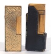 Two gold plated Dunhill gas lighters, each approx 6cm x 2.5cm, one with leather case, fair condition