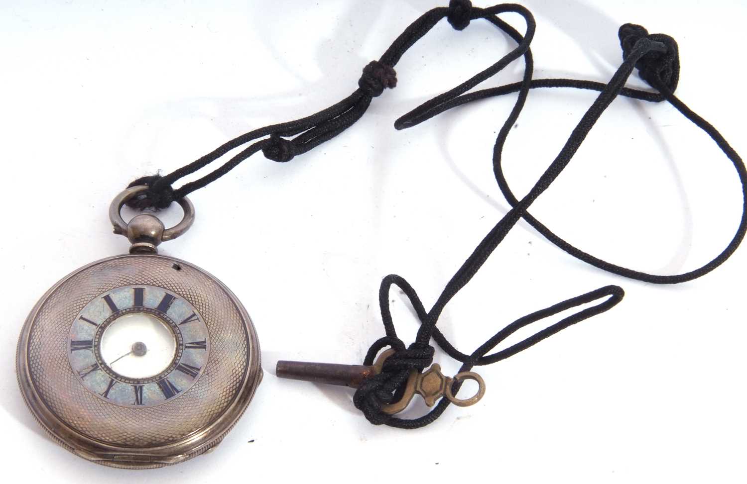 Mid/Last quarter of 19th century white metal hunter pocket watch, features a white enamel dial