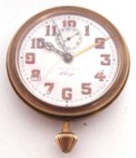Eterna & Tiffany & Co 8-day alarm car clock, the timepiece has a brass case and features a white