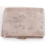 Cased silver ladies compact square form with engine turned decoration, push in clasp opening to a