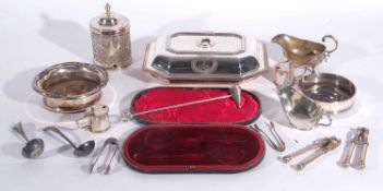 A box of silver plated wares to include two coasters, a terrine dish, a drum mustard, nut crackers