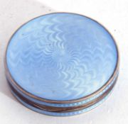 Continental white metal and enamel circular box the lid and sides with a light blue guilloche
