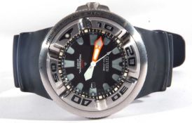 A Citizen Eco Drive 300m professional divers watch. The watch has a slate grey dial with luminous