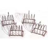 Group of three matching small toast racks of five division form with a loop handle and hallmarked