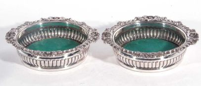 Pair of antique old Sheffield plated wine coasters, circa 1830 of classic form, the rims with