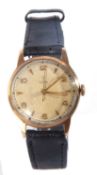Vintage 9 carat gold gents Tudor wrist watch. The watch has a crown wound 15 jewel movement which is