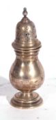 George V silver caster of typical ballister form with pull off pierced lid with urn finial, to a