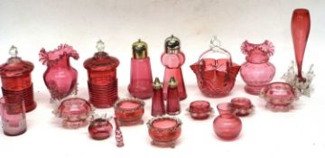 Quantity of cranberry glass wares including salts, jars and covers and vases, also morler mug with