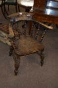 Victorian elm seated bow back captains chair, 67 cm wide