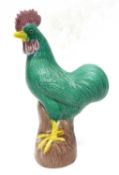 Chinese porcelain model of a cockerel with majolica type glazes, 20 cm high