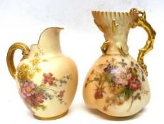 Two blush ground Worcester jugs both decorated with flowers