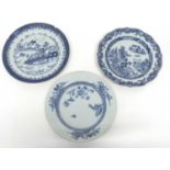 Group of three 18th Century Chinese porcelain plates with blue and white designs, 27 cm diametre (3)