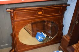 Edwardian mahogany and inlaid overmantel mirror with oval bevelled plate, 107cm wide