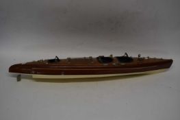 20th Century hardwood model boat with fitted interior together with a small booklet from Authentic