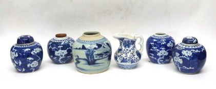 Quantity of Chinese porcelain jars and covers decorated with prunus on a blue ground together with a