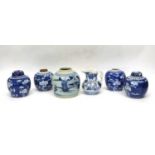 Quantity of Chinese porcelain jars and covers decorated with prunus on a blue ground together with a