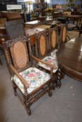 Set of eight early 20th Century oak carolean style dining chairs comprising two carver chairs and