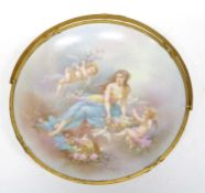 Late 19th Century porcelain dish with gilt handle, the dish with printed design of cherubs and a
