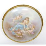 Late 19th Century porcelain dish with gilt handle, the dish with printed design of cherubs and a