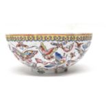 Chinese eggshell porcelain bowl of lobed form decorated with butterflies and insects within a yellow