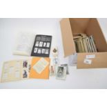 Box containing quantity of postcards and albums and valuation book for cigarette cards