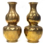 A pair of Chinese brass vases of gours shape with apocryphal mark to base (2), 20 cm high